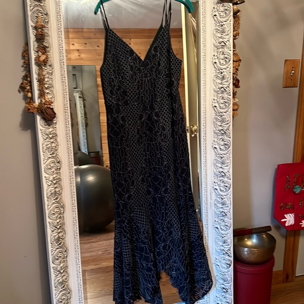 Beautiful asymmetrical gown…navy with silver metallic stitching.